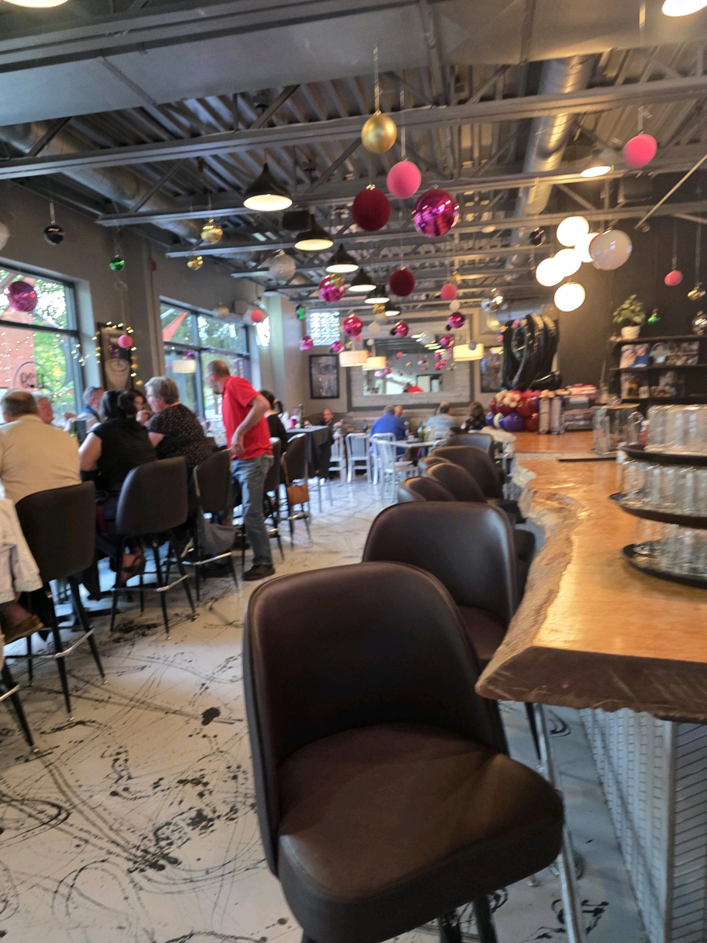 Guests seated at the real 1129 bar