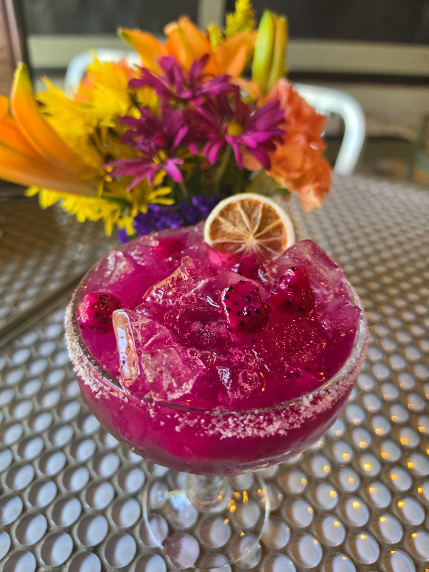 Bright magenta cocktail served at 1129